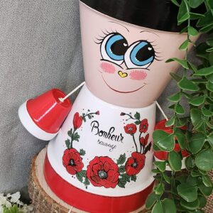 Personnage décoratif en pot de terre